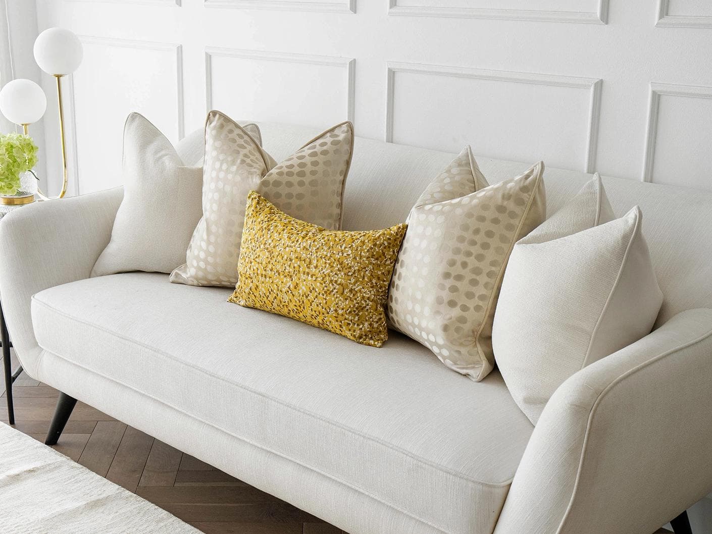 Valentina Bundle cushion in white, gold, yellow and beige, shown in a lifestyle right view as image 2
