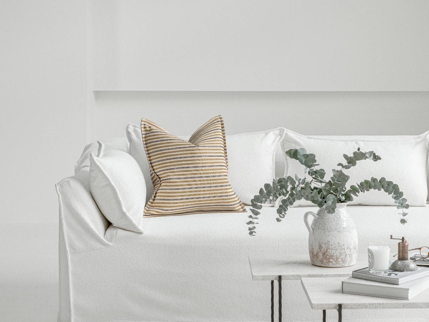 Wren Laurent cushion in ivory and multicolour, shown in a lifestyle front view as image 4