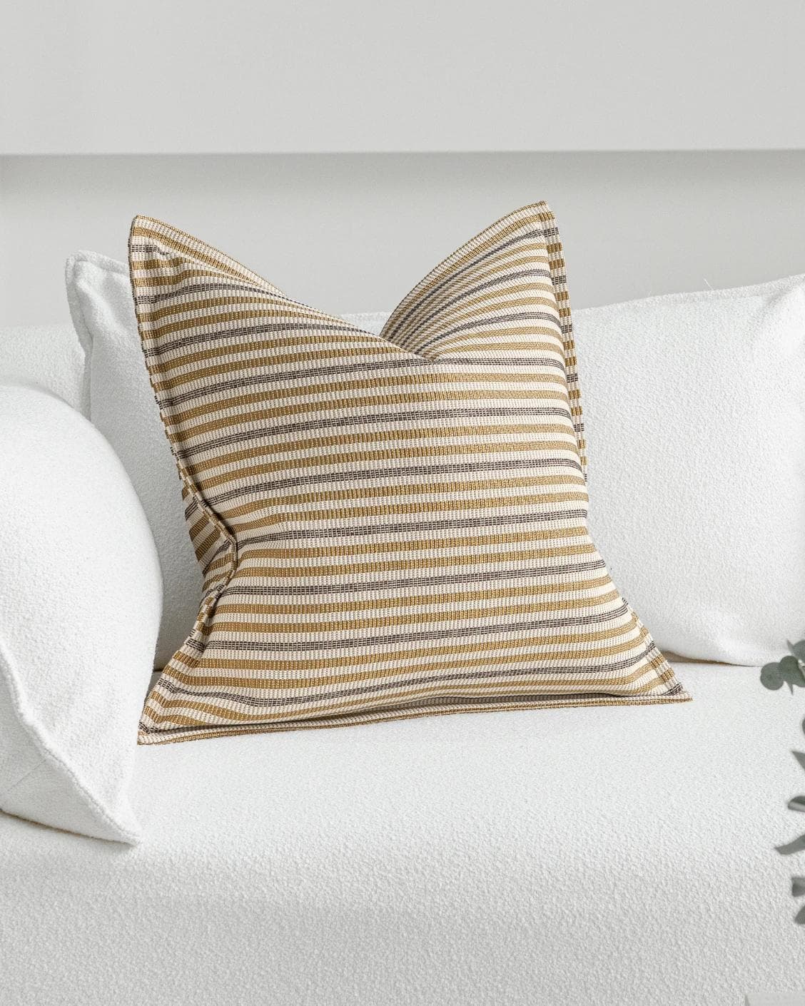 Wren Laurent cushion in ivory and multicolour, shown in a lifestyle front view as image 2