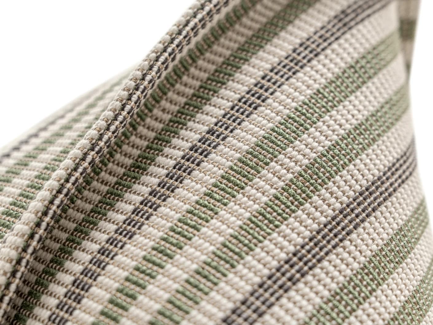 Wren Pistachio cushion in green and ivory, shown in a product close-up as image 6