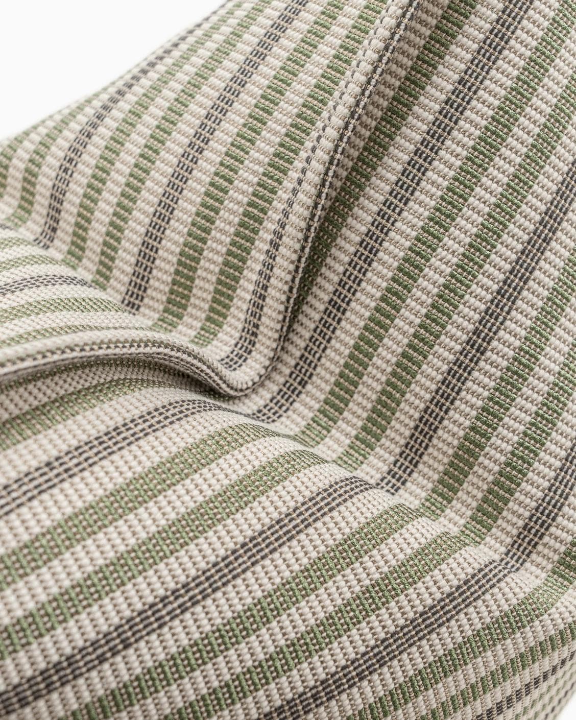 Wren Pistachio cushion in green and ivory, shown in a product top view as image 9