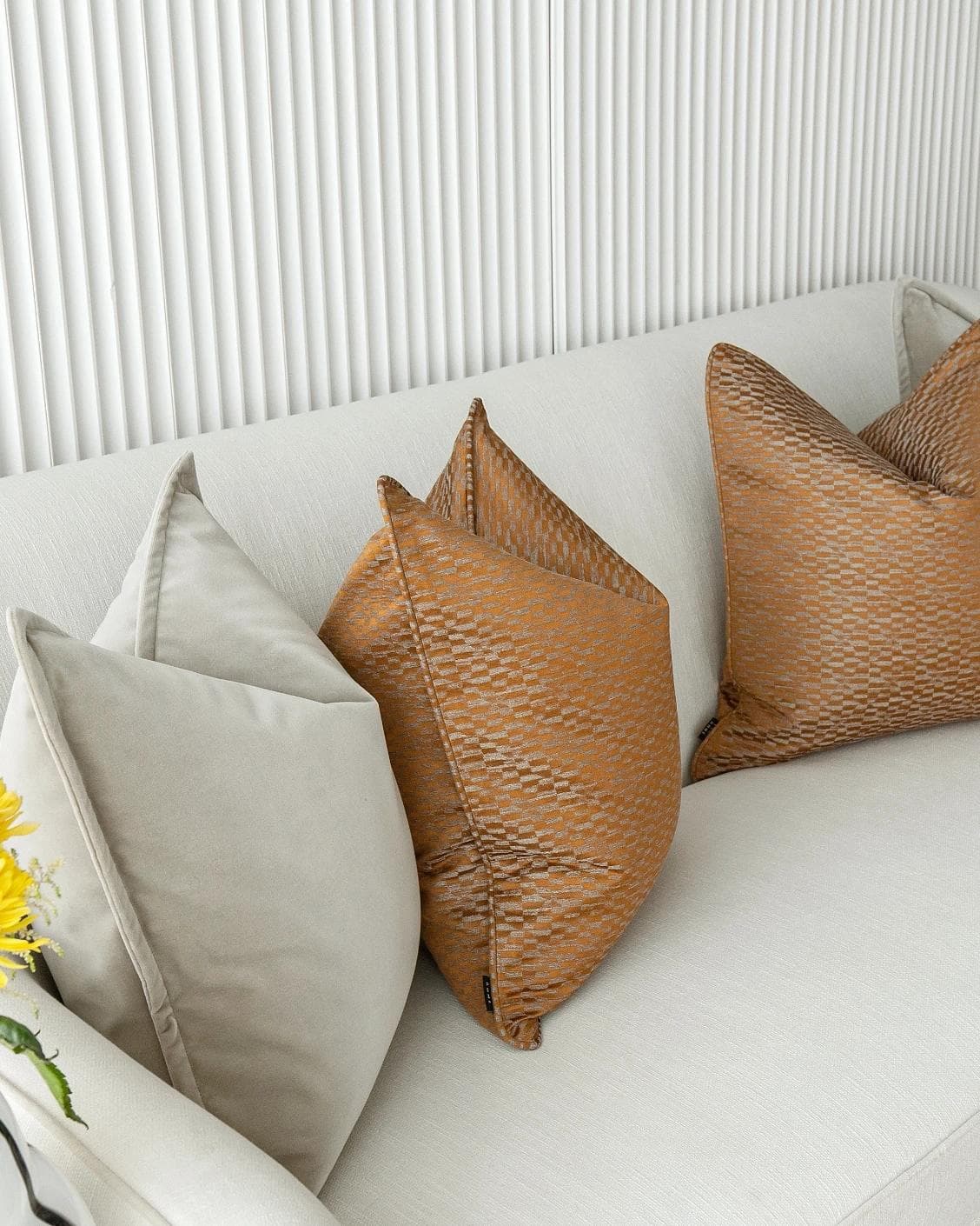 Yabella Bundle cushion in grey and orange, shown in a product left view as image 7