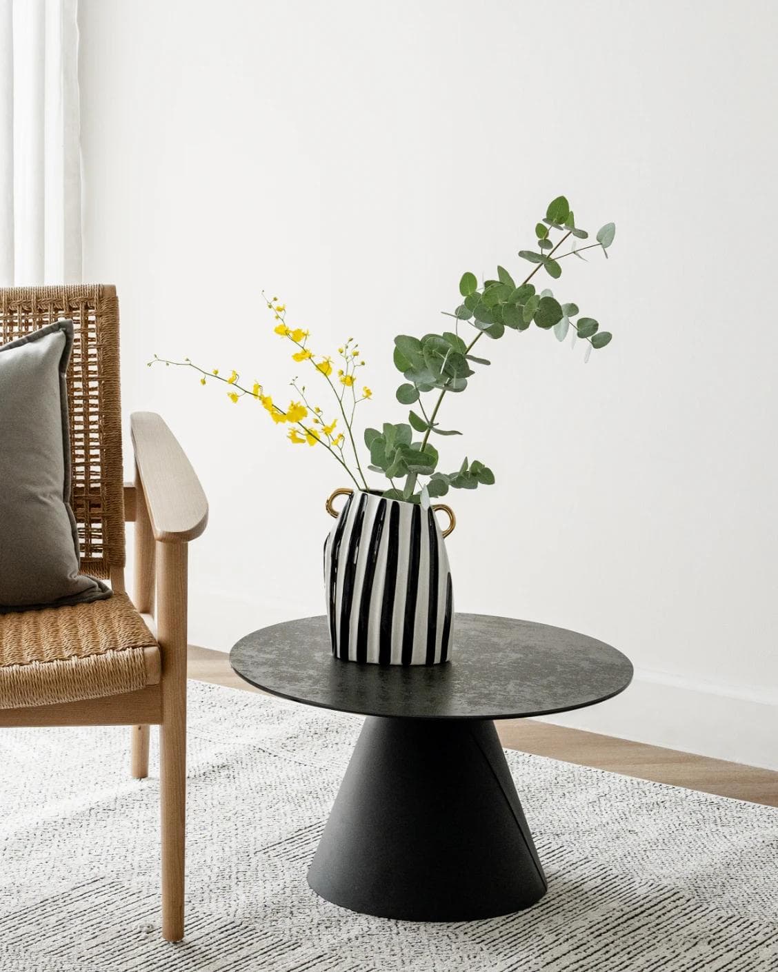 Yara Arneson vases in gold, black and white, shown in a lifestyle front view as image 2