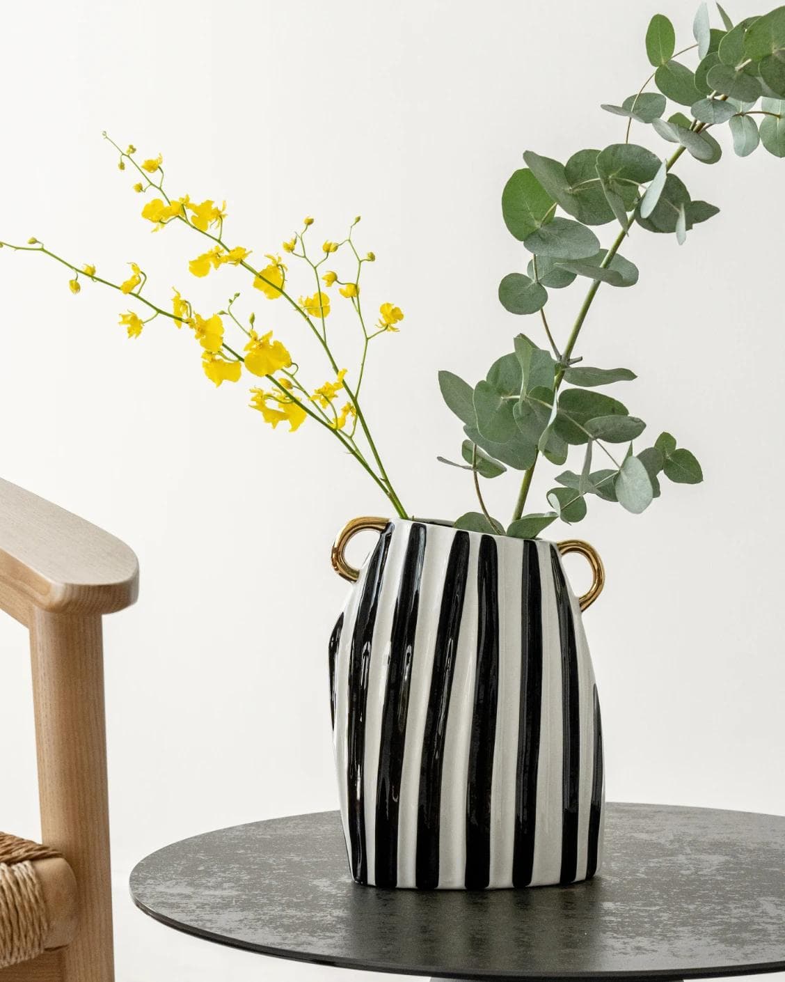 Yara Arneson vases in gold, black and white, shown in a lifestyle front view as image 4