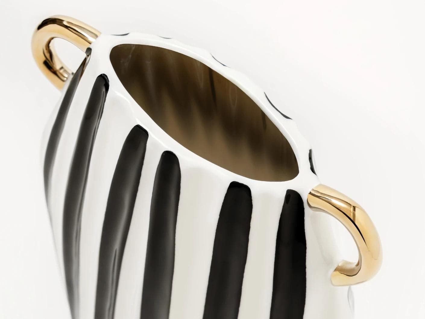 Yara Arneson vases in gold, black and white, shown in a product top view as image 9