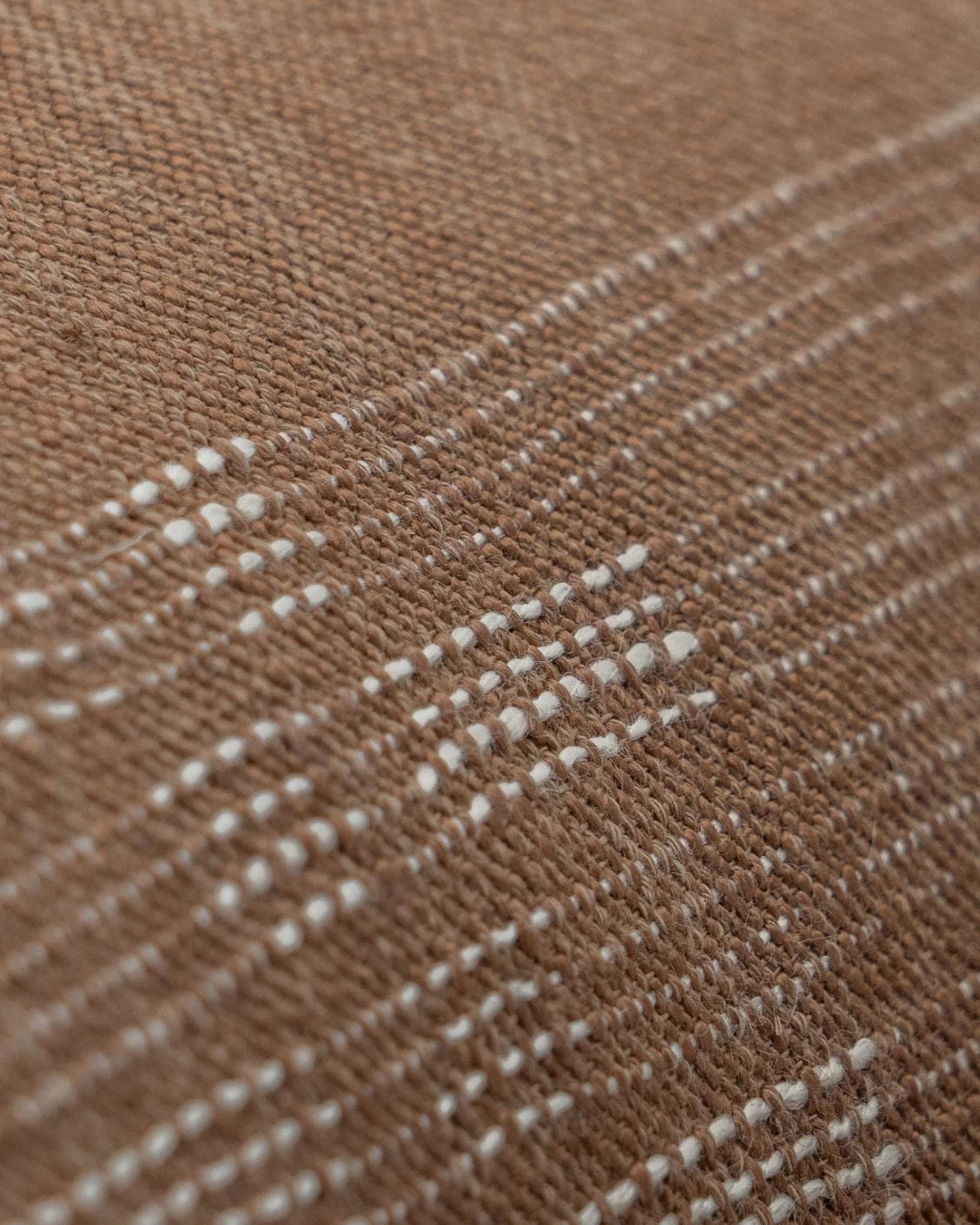 Yon Brick cushion in brown, shown in a product close-up as image 6