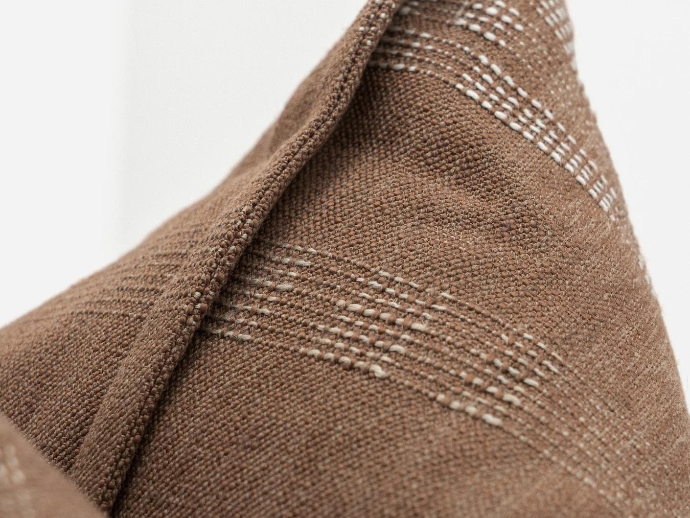 Yon Brick cushion in brown, shown in a product close-up as image 7