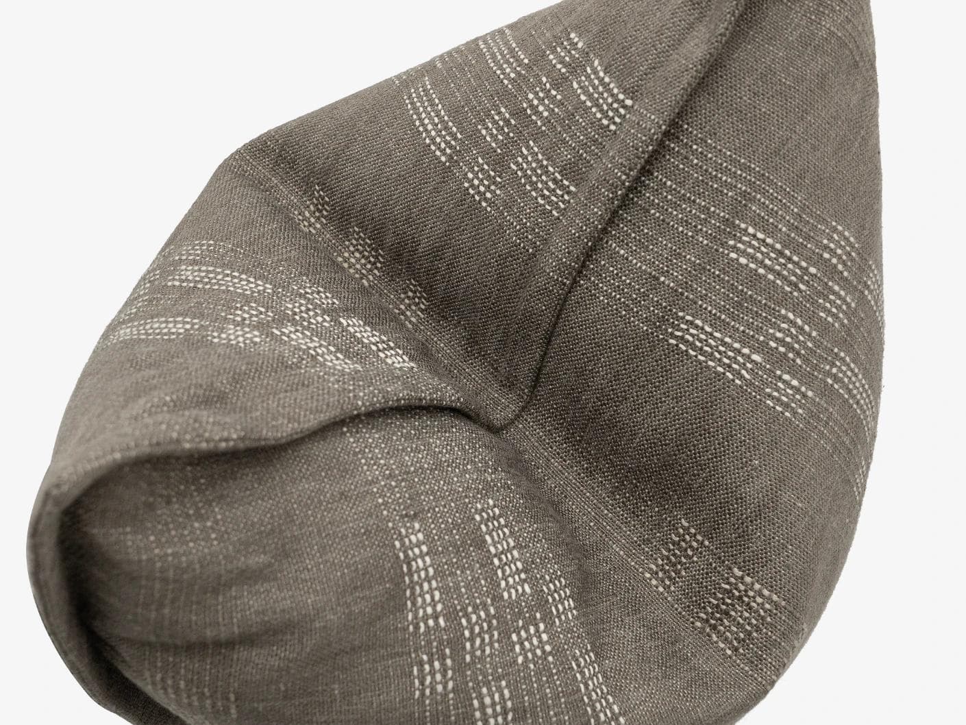 Yon Laurent cushion in taupe and charcoal, shown in a product top view as image 10
