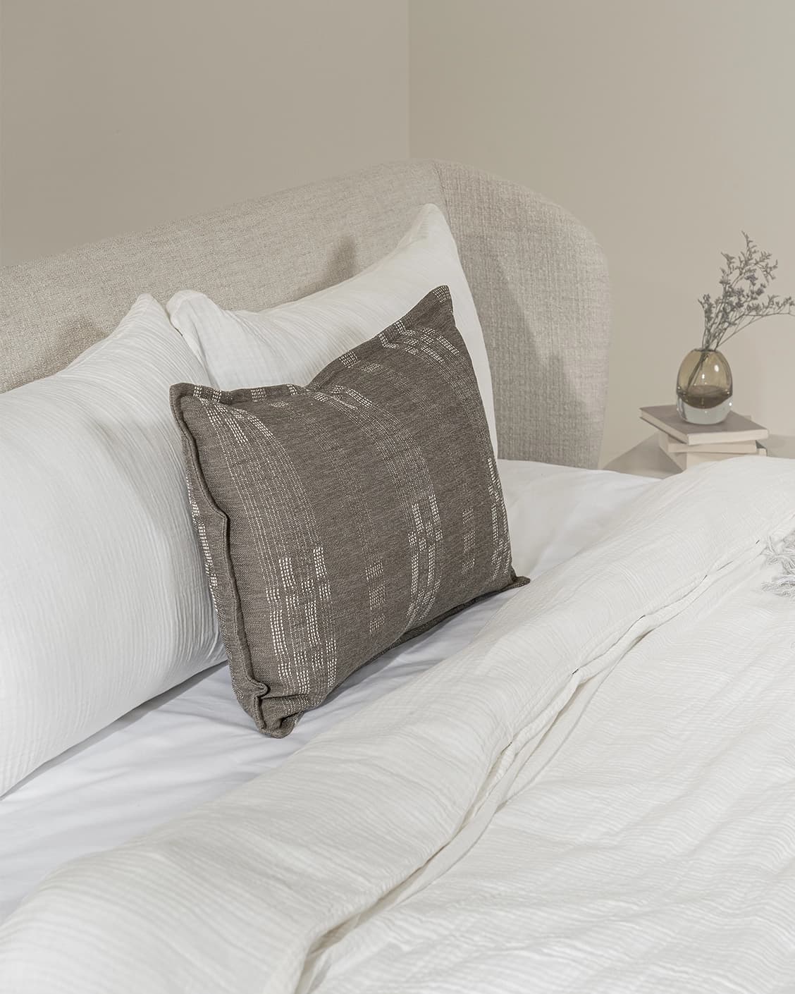 Yon Laurent III cushion, shown in a lifestyle left view as image 4