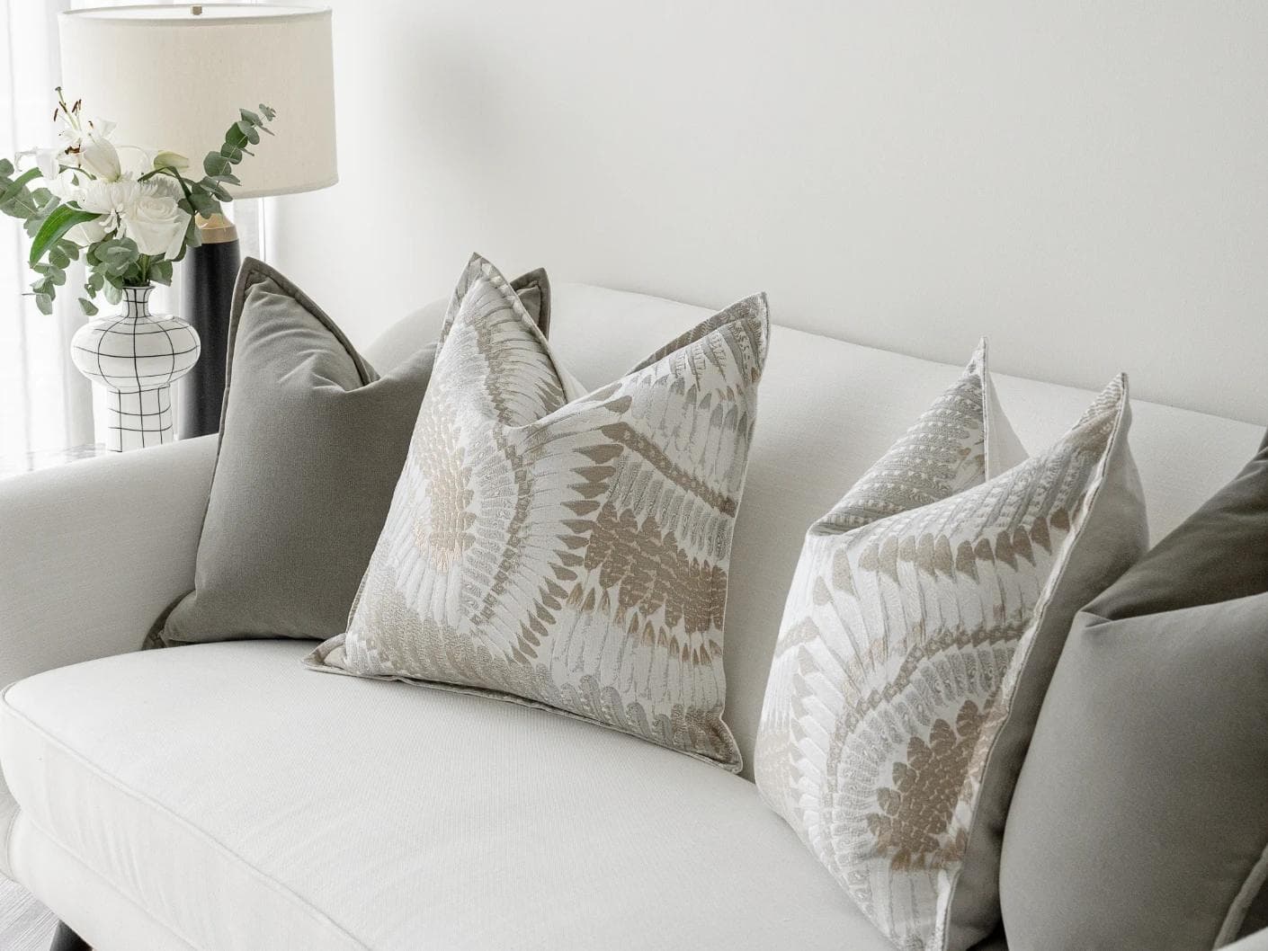 Yumi Bundle cushion in grey and brown, shown in a lifestyle right view as image 5