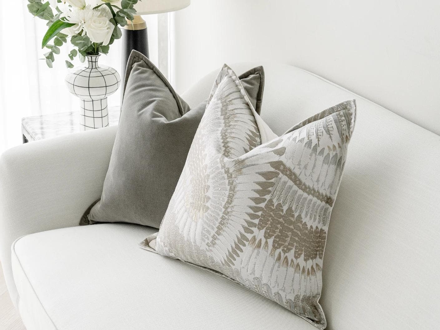 Yumi Bundle cushion in grey and brown, shown in a lifestyle right view as image 6