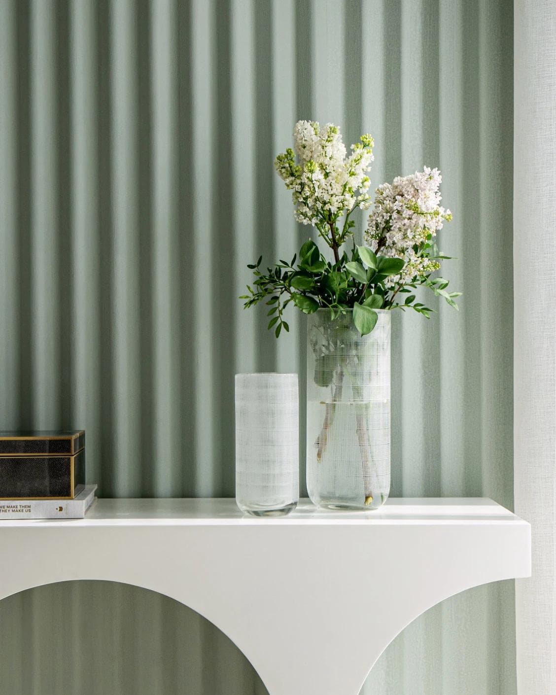 Zaha Bundle vases in white and translucent, shown in a lifestyle front view as image 4