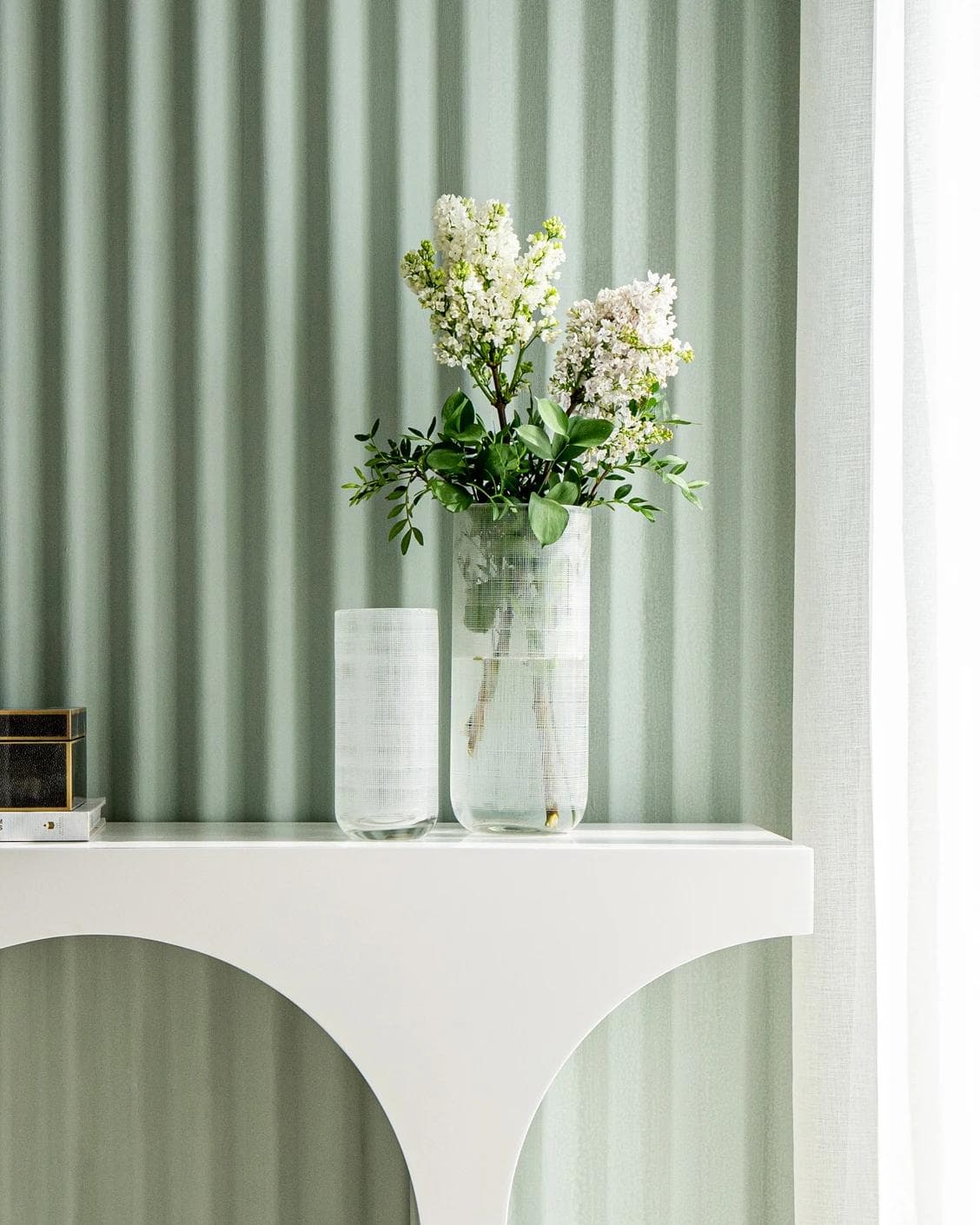 Zaha Bundle vases in white and translucent, shown in a lifestyle front view as image 6