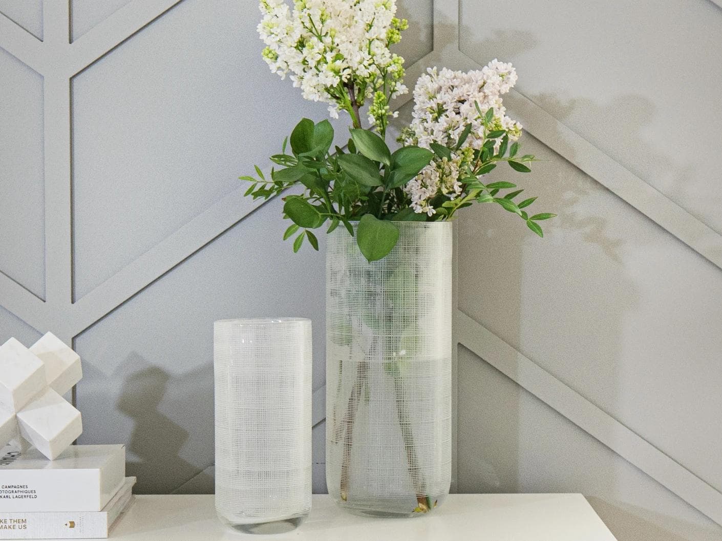 Zaha Bundle vases in white and translucent, shown in a lifestyle front view as image 8