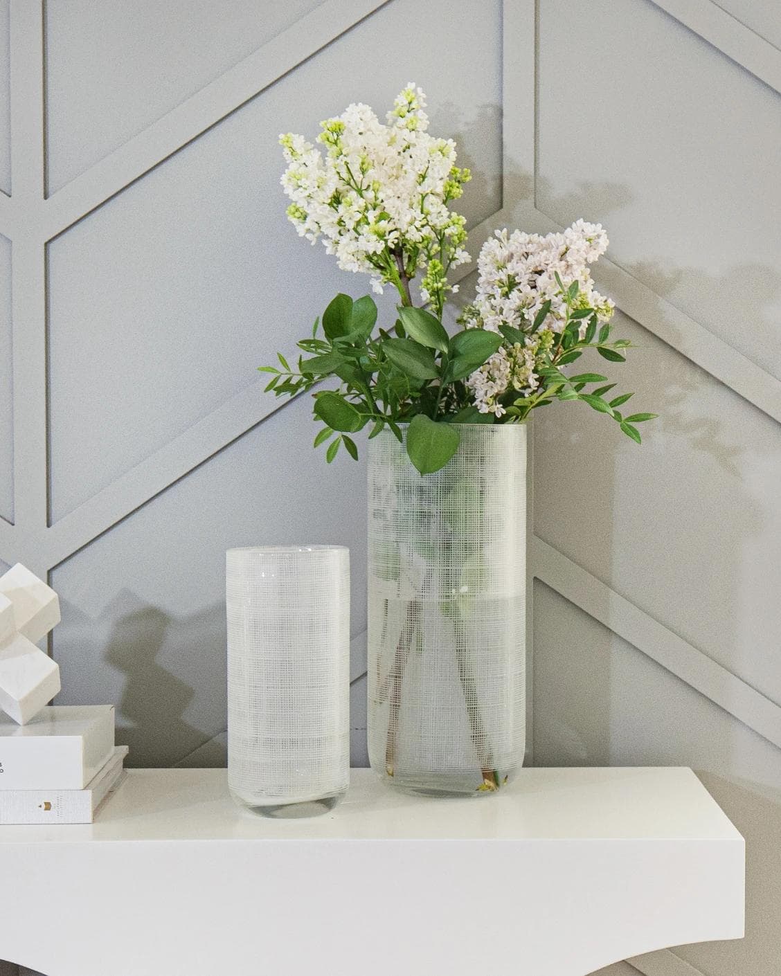 Zaha Bundle vases in white and translucent, shown in a lifestyle front view as image 8
