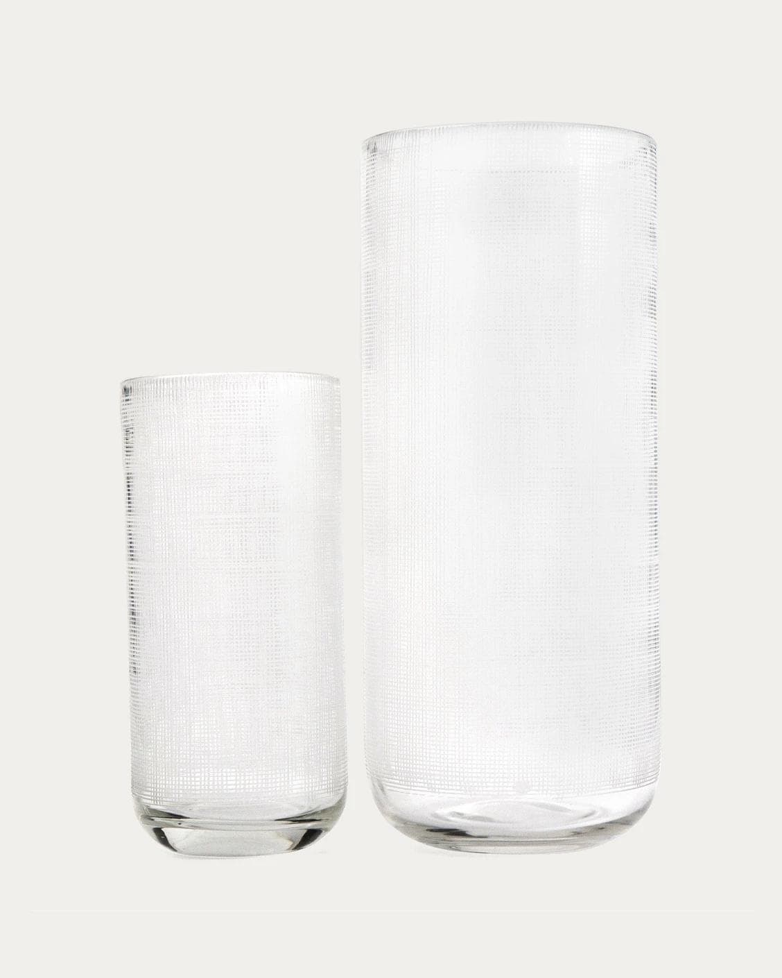 Zaha Bundle vases in white and translucent, shown in a product front view as image 1