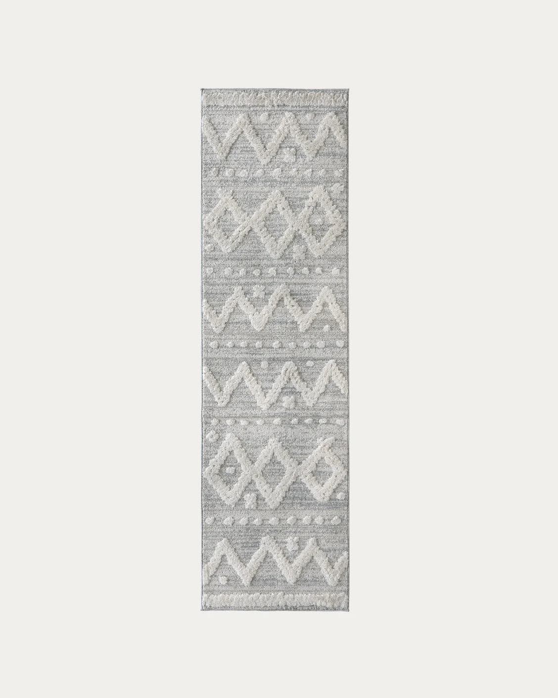 Zahra Snow carpets in grey and off white, shown in a product top view as image 1