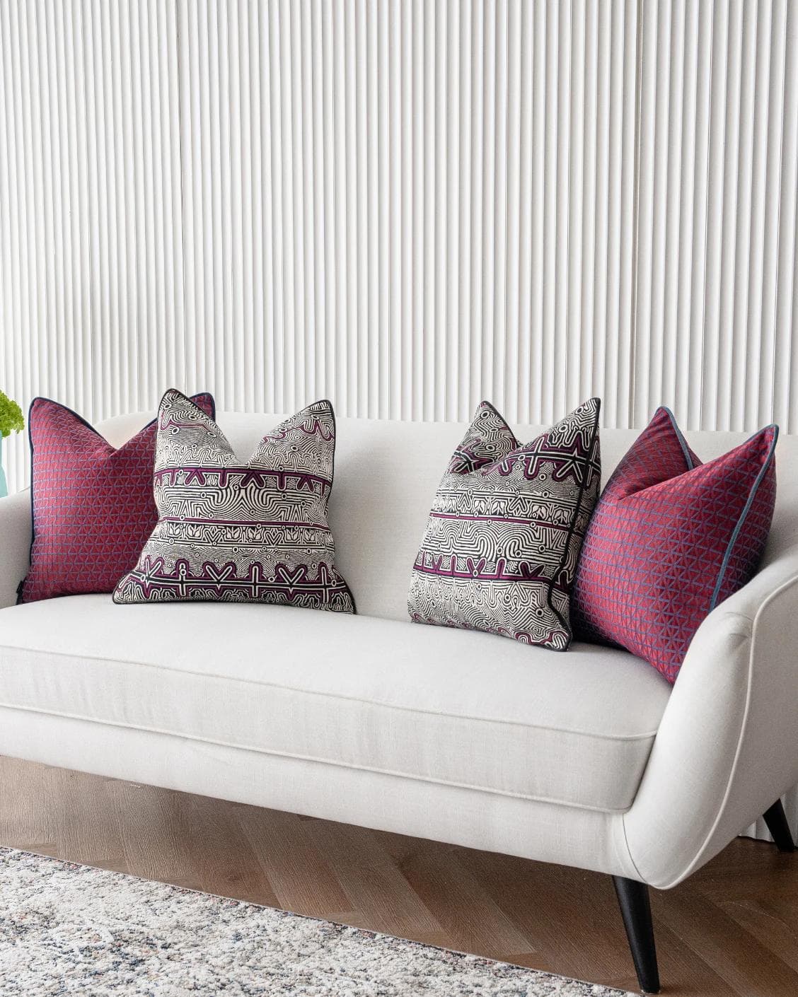 Zain Bundle cushion in black, silver and purple, shown in a lifestyle right view as image 2