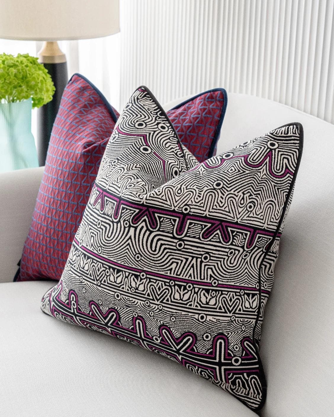 Zain Bundle cushion in black, silver and purple, shown in a lifestyle right view as image 5