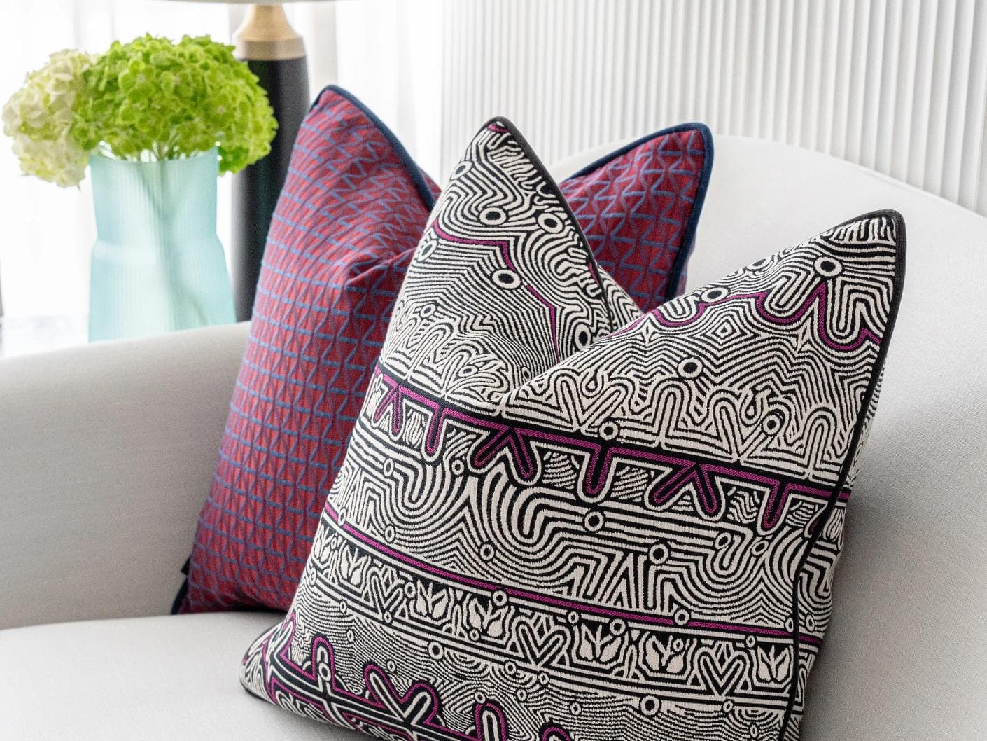 Zain Bundle cushion in black, silver and purple, shown in a lifestyle right view as image 5