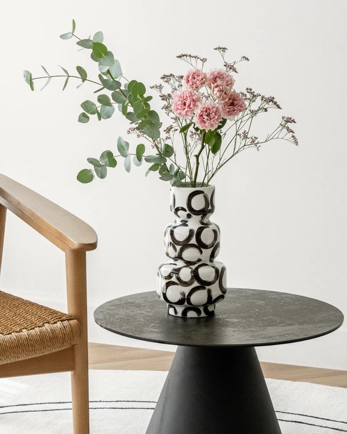 Zara Arneson vases in white and black, shown in a lifestyle front view as image 2