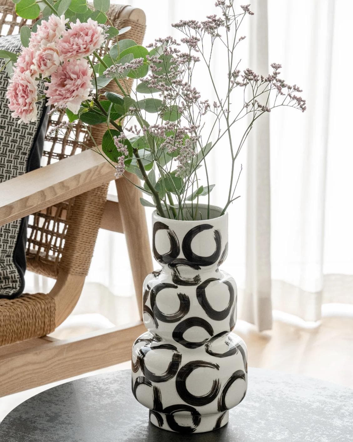 Zara Arneson vases in white and black, shown in a lifestyle right view as image 6