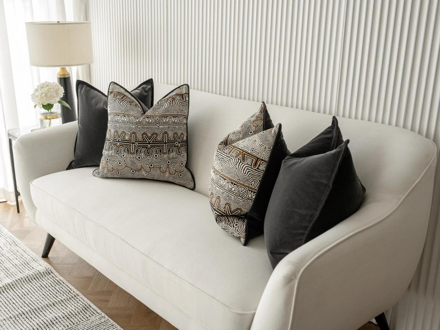 Zayn Bundle cushion in black, grey and silver, shown in a lifestyle right view as image 5