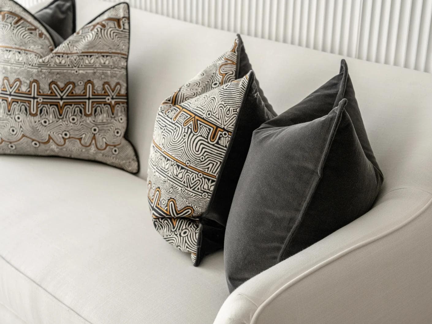 Zayn Bundle cushion in black, grey and silver, shown in a product right view as image 7