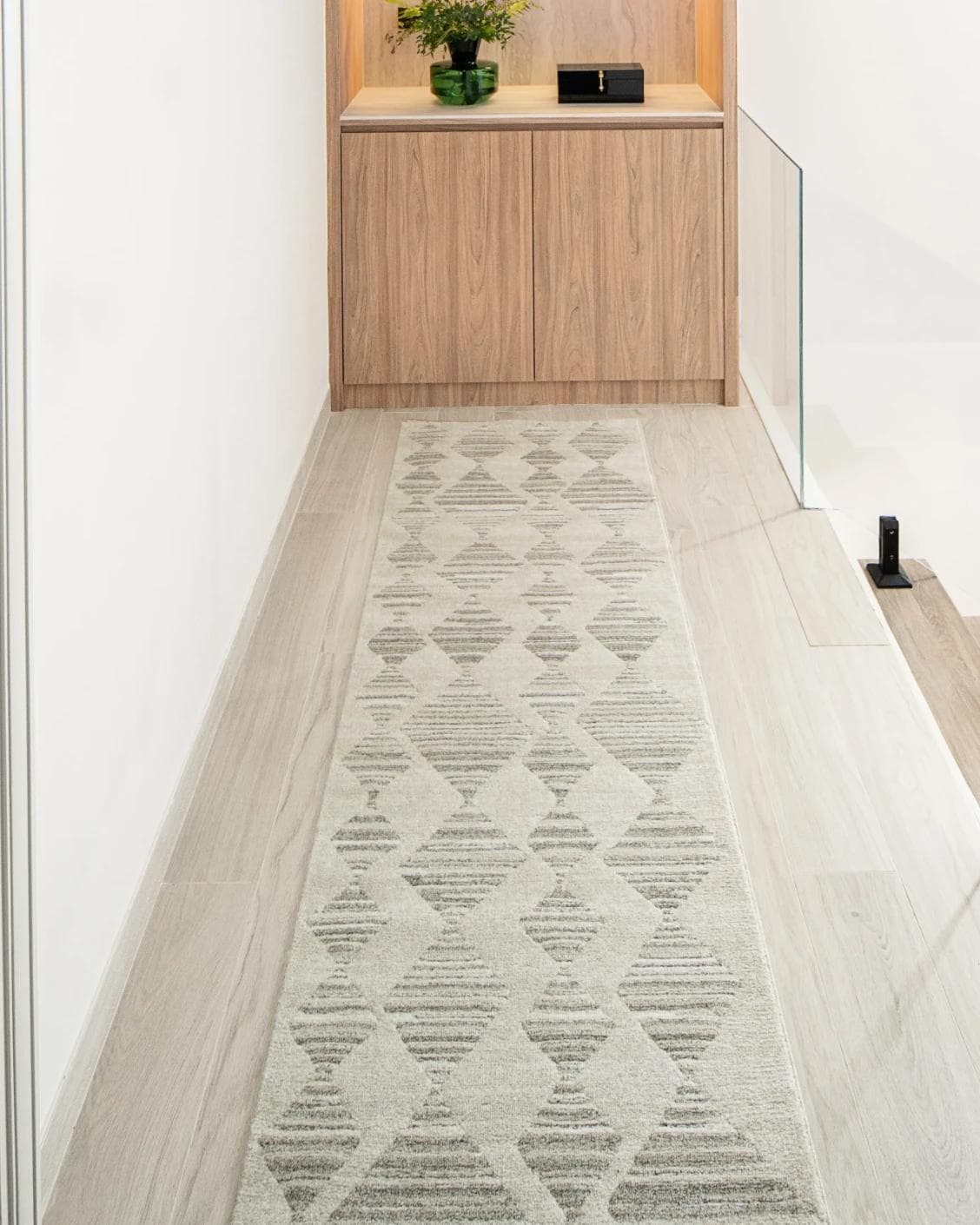 Zen Alba Runners carpet in cream, beige and grey, shown in a lifestyle front view