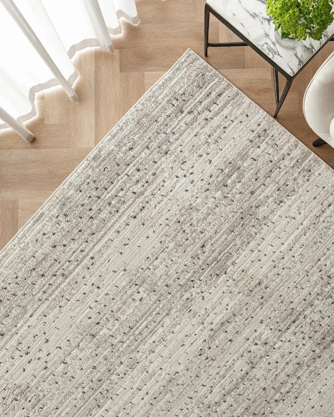 Zen Ashton carpet in beige, shown in a lifestyle top view as image 2