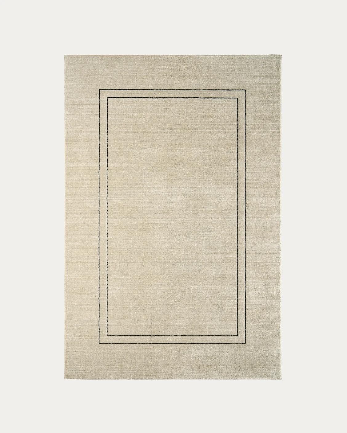 Zen Colin carpets in black and beige, shown in a product top view as image 1