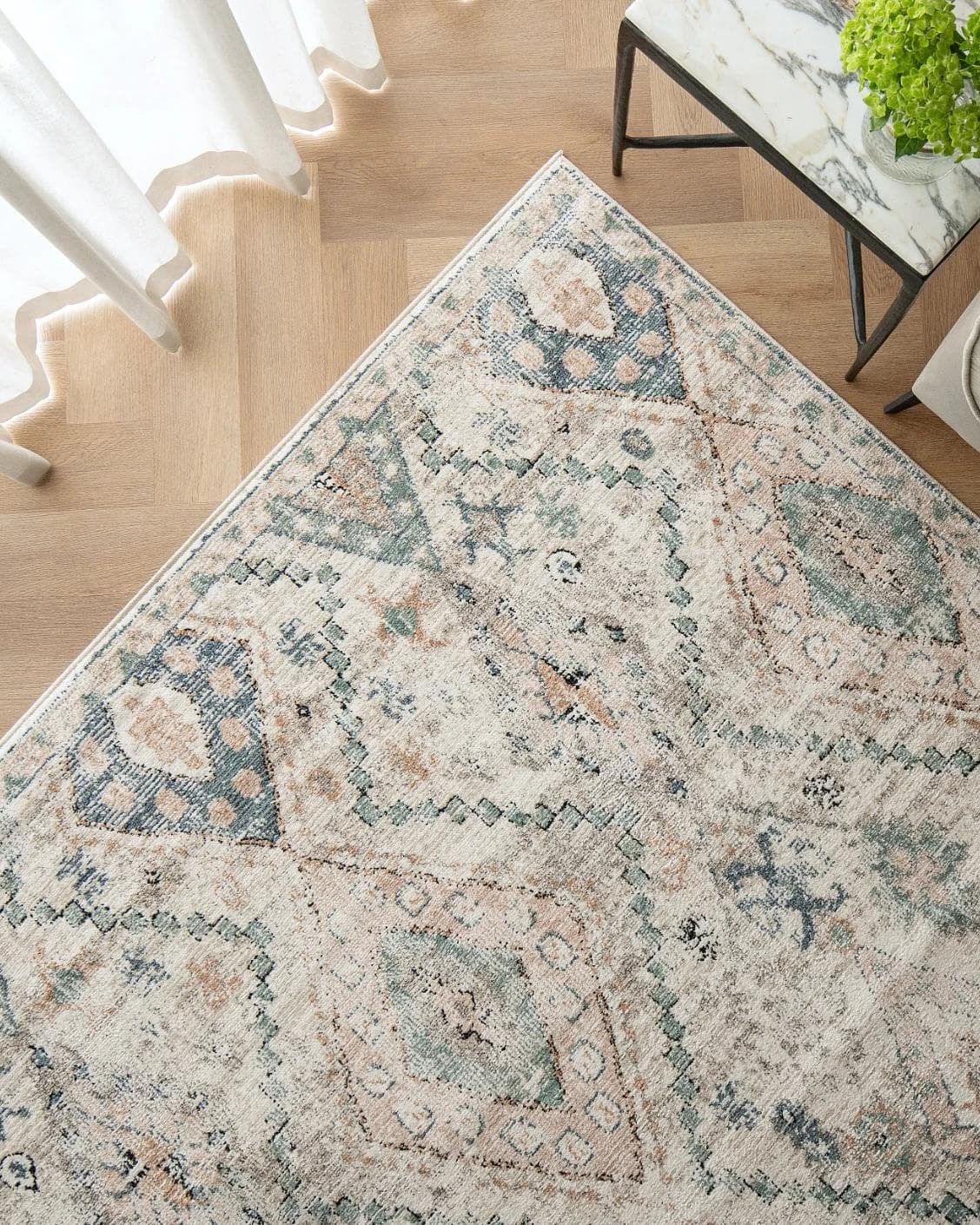 Zen Sandy carpet in beige and blue, shown in a lifestyle top view as image 2