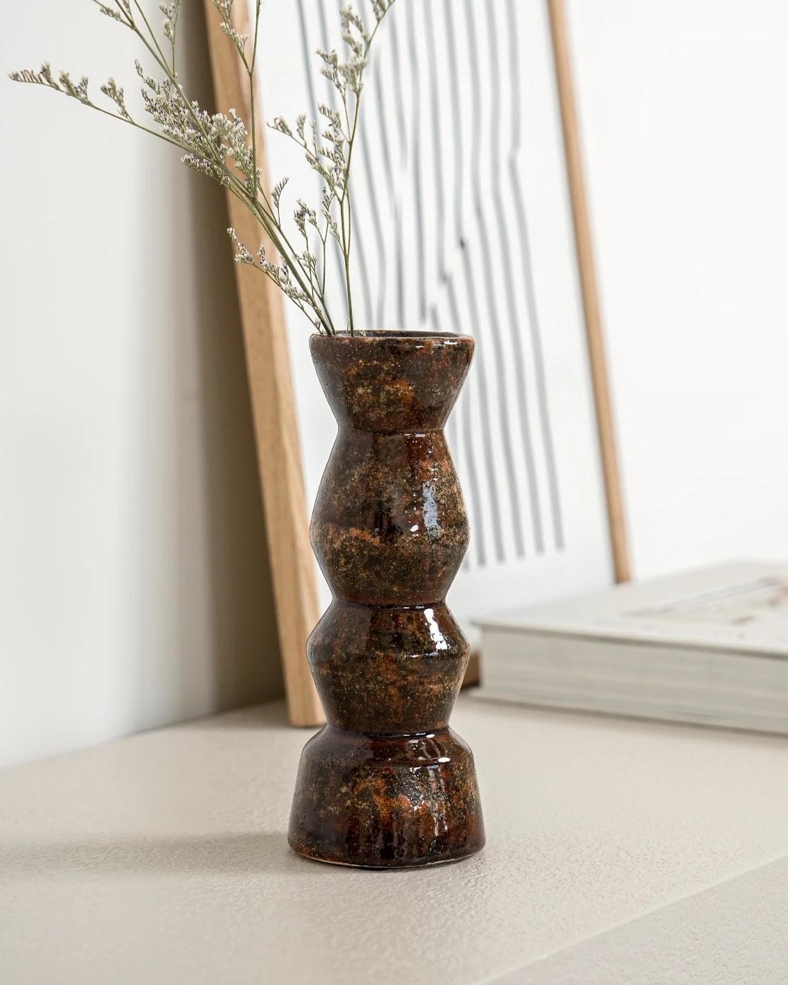Zenith Terra II statues and sculptures in brown, shown in a lifestyle left view as image 5