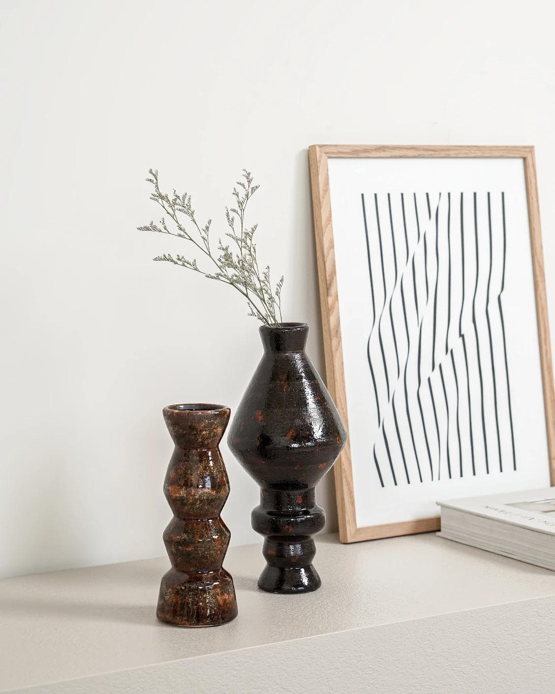 Zenith Terra Bundle statues and sculptures in brown and black, shown in a lifestyle left view as image 5