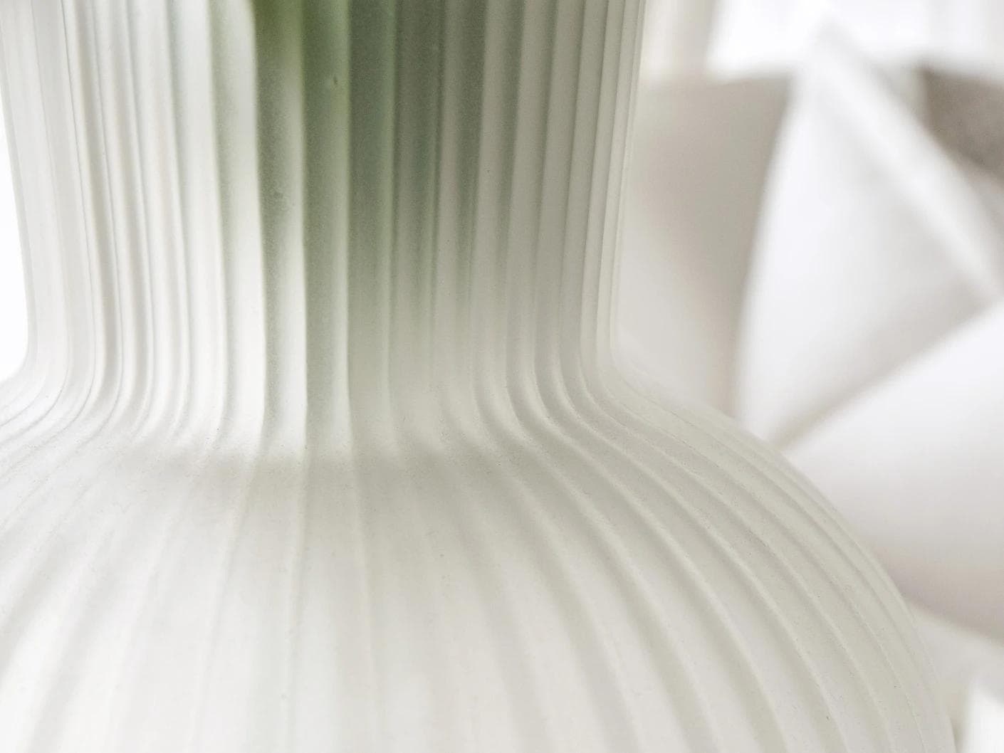 Zenya Bundle vases in white, shown in a lifestyle close-up top view as image 4