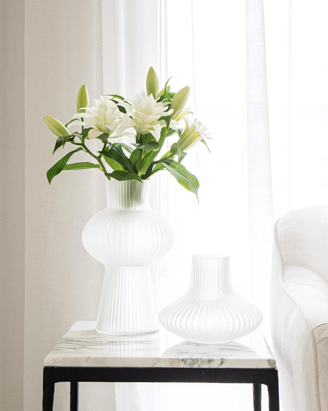 Zenya Bundle vases in white, shown in a lifestyle front view as image 5