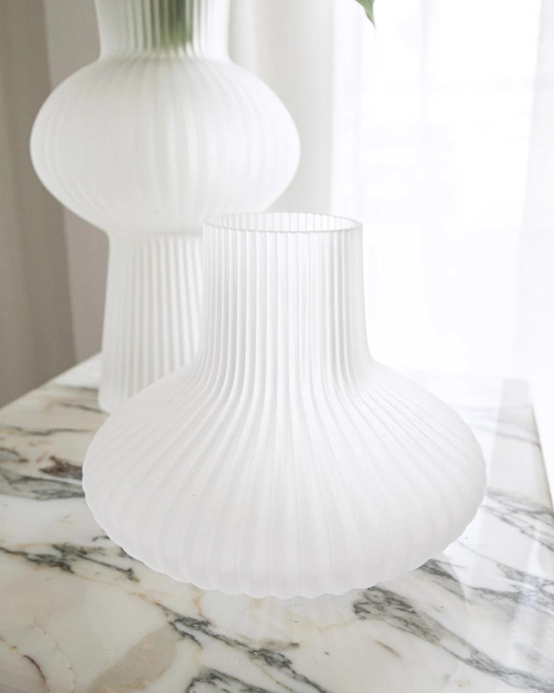 Zenya Bundle vases in white, shown in a lifestyle front view as image 6
