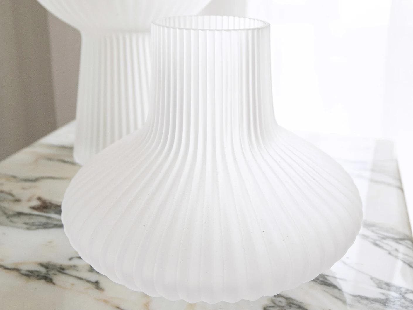 Zenya Bundle vases in white, shown in a lifestyle front view as image 6