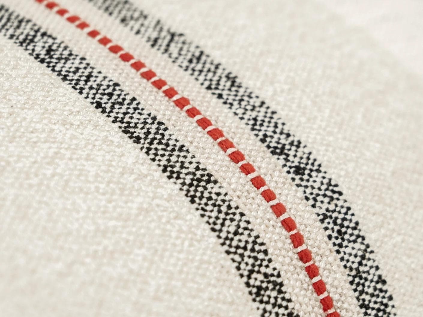 Zia Hodler cushion in multicolour and ivory, shown in a product close-up as image 6