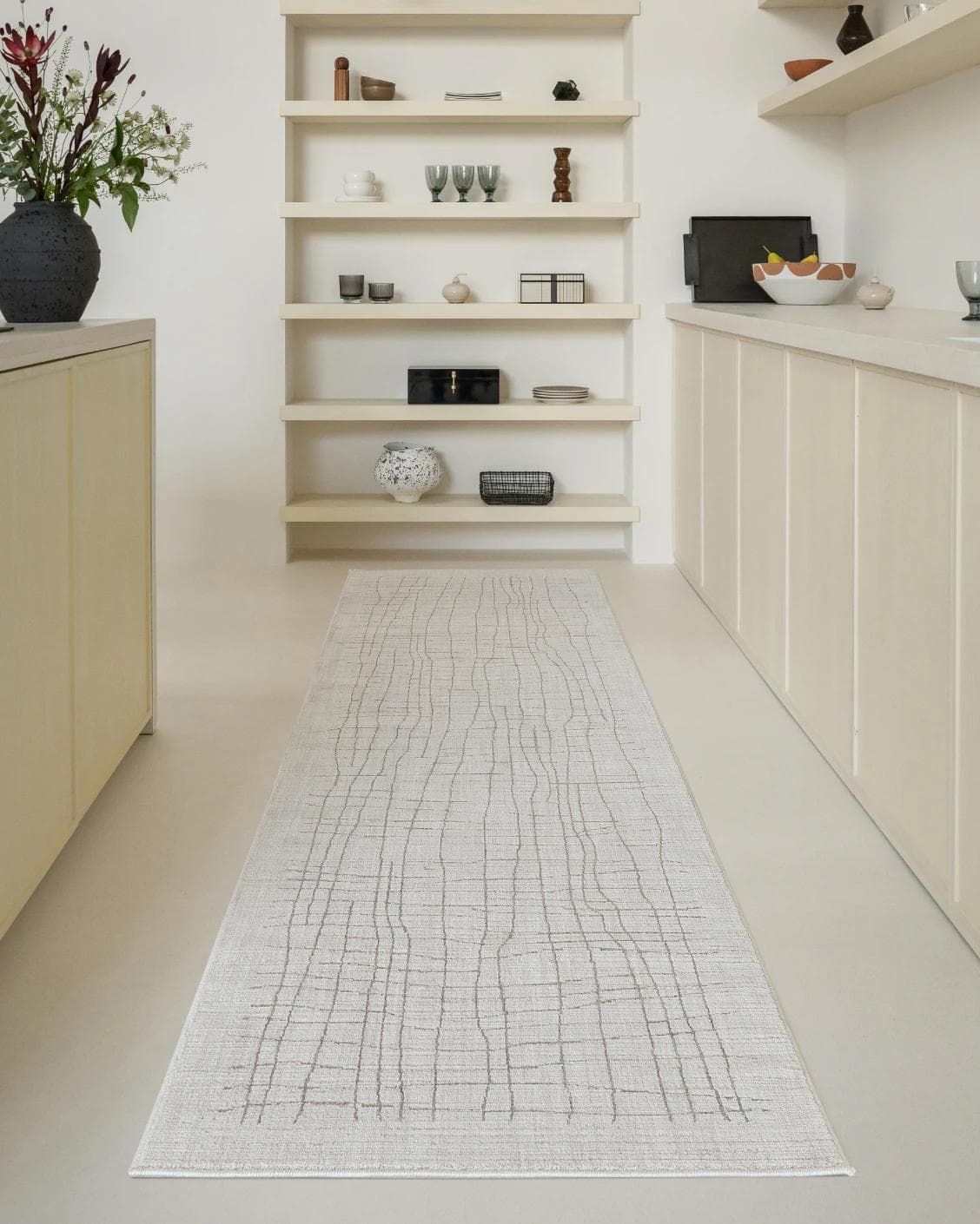 Zion Sandy Runners carpet in ivory, shown in a lifestyle front view