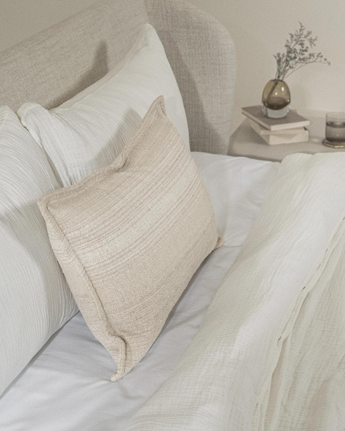 Zoe Laurent III cushion in beige, shown in a lifestyle left view as image 5